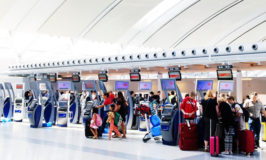 Travel English Phrasal Verb: Check in | English Teacher Melanie