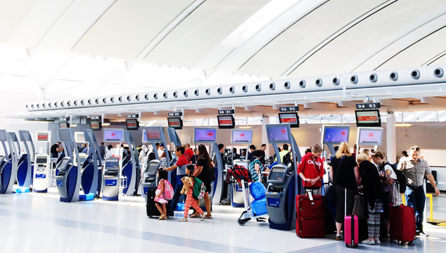 Travel English Phrasal Verb: Check in | English Teacher Melanie
